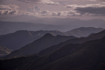 mountains valley and cloudy sky