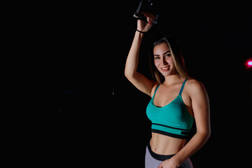 Obraz premium latina woman at the bodybuilding gym