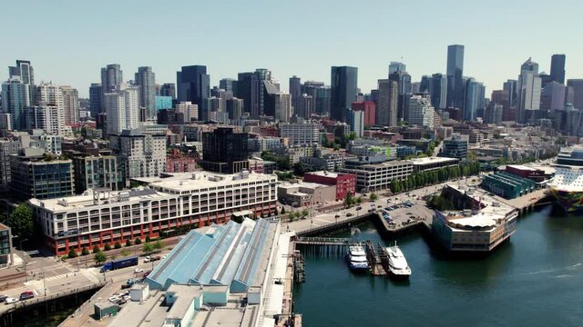 Waterfront Cityscape Aerial with Seattle Skyline Buildings Parallax on Blue Sky Background