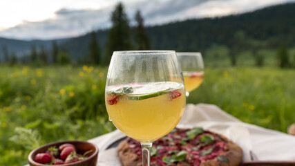 a glass of wine in nature in summer