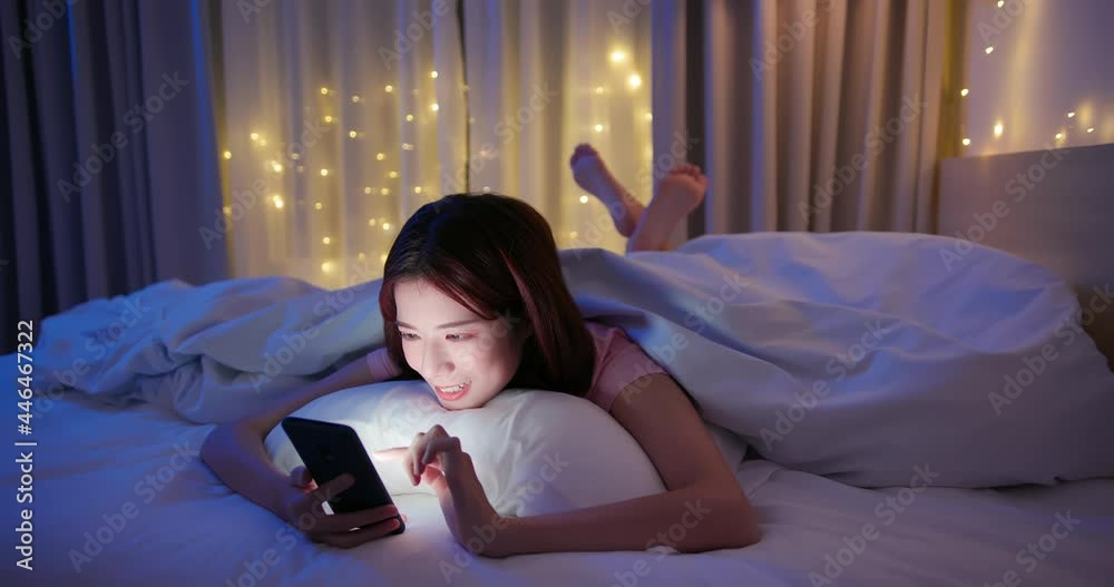 Canvas Prints woman use smartphone on bed