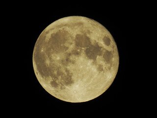 Strawberry full moon of June 2021 over Old Bridge, New Jersey, in sepia against a black background