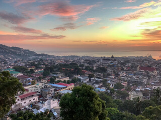 Fototapeta na wymiar A Sunrise View of Cap-Haitien, Haiti from the Hills Above