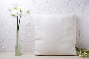 Pillow mockup with white lily flowers and silk ribbons
