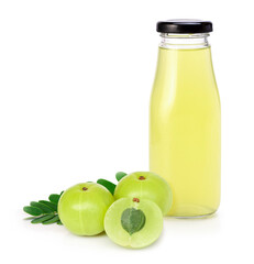 Amla or Indian gooseberry fruits (phyllanthus emblica) with glass bottle of gooseberry juice isolated on white