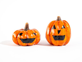 Happy Halloween, pumpkin and leaves on a white background. 