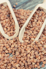Heap of buckwheat containing vitamins and dietary fiber. Healthy nutrition