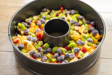 A Bowl of Rainbow Colored Fruit Salad Healthy food concept