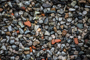Background of stones of the Thames riverbed
