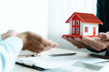 Real estate agent give a financial advice to customer about house debt..