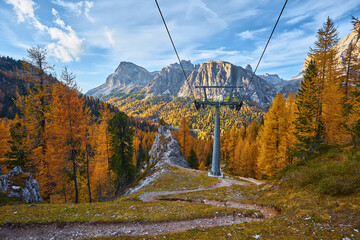 Ski lifts along the ski slope near the Cinque Torri mountains the background Tofane mountain near the famous town of Cortina d'Ampezzo in Italy