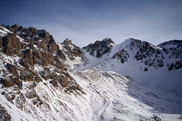 Obraz premium Snow Rocky Mountains with Blue Sky in Kazakhstan 