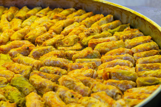 Romanian traditional food – Sarmale. Stuffed cabbage rolls with meat and rice boiled in a pan, ready for serving 