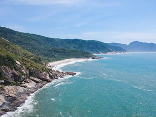 Aerial view of Praia do Perigoso and Pedra da Tartaruga, Rio de Janeiro. Sunny day, Drone photo.