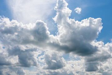 Blue sky white cloud fluffy gray clouds.dramatic blue sky,clouds warm summer day background.