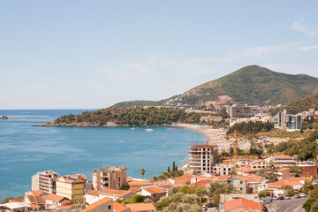 Aerial view on seascape of Adriatic sea coast in Budva Riviera. Location place Becici opposite the island of St. Nicholas, Montenegro, Balkans, Adriatic sea