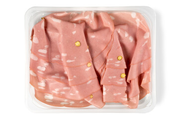 Slices of Bologna mortadella sausage with pistachio  in plastic tray for sale in supermarket, top...