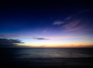 Fototapeta na wymiar Stars at Sunrise over the Atlantic Ocean