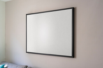 Interior home decoration, empty black square frame, poster, white canvas mock up on a gray wall,...