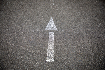 arrow on asphalt