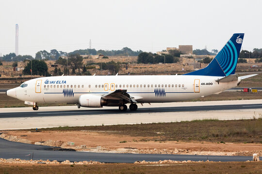 Luqa, Malta September 12, 2016: IAI Elta Boeing 737-4Q8 [4X-AOO] landing on runway 13 in the late evening after sunset. 