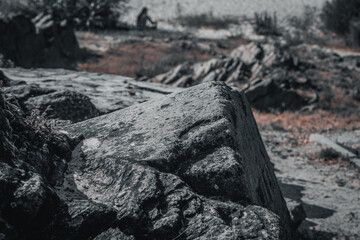Old stones on the embankment