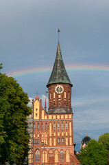 Fototapeta na wymiar Cathedral of Konigsberg on the Kneiphof island against rainbow, Kaliningrad, Russia