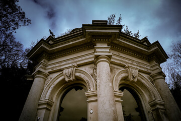 Eerie scenery of a historical arch building on a stormy day