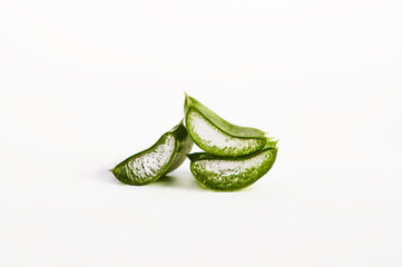 Three slices of aloe vera isolated on white background close-up. Skincare, health care concept.