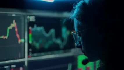 Trader is working with multiple computer screens with charts and data analysis and stock broker trading online. Concept of bitcoin and ethereum blockchain trading. Worker is checking market data