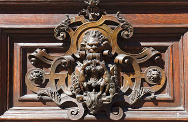 European Vintage old metal wrought iron door knocker. Design detail. Paris.