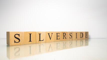 The name Silverside was created from wooden letter cubes. Seafood and food.