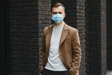 Businessman with a breathing mask isolated in office space