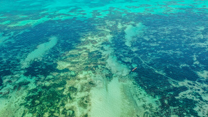 Fototapeta na wymiar Aerial top view on blue ocean, Zanzibar