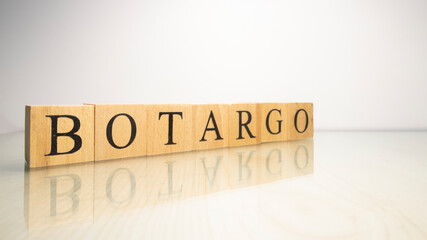 The name Botargo was created from wooden letter cubes. Seafood and food.