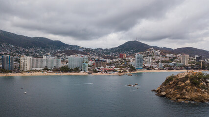Naklejka na ściany i meble Aerial photography of acapulco beach during a storm