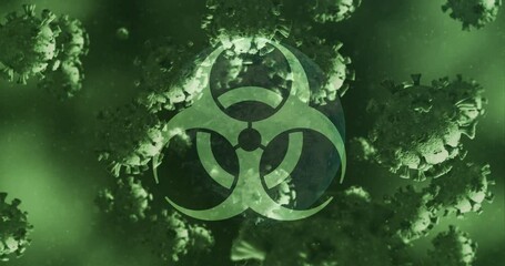 Animation of biohazard symbol and covid 19 cells floating over globe - Powered by Adobe