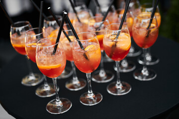 summer sangria on the terrace of the restaurant with straws