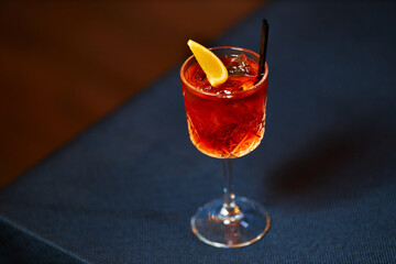 red summer sangria with orange on dark background