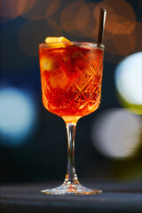 red summer sangria with orange on dark background