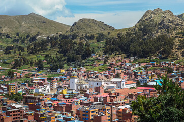 Aerial view of Copacabana town. Buildings, houses and church. Cityscape. La Paz Department, Bolivia