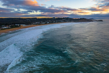 Surfs up - aerial sunrise seascape