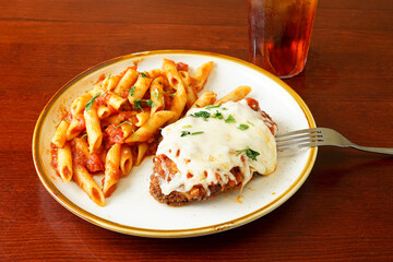 Chicken Parmesan with penne pasta