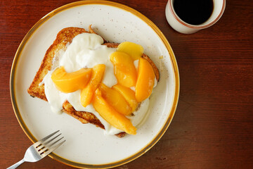 Brioche French toast with peaches and cream