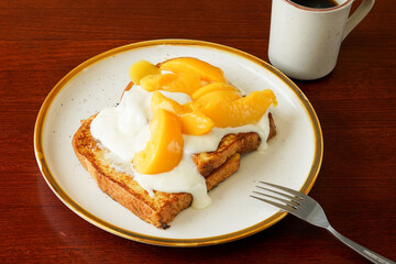 Brioche French toast with peaches and cream