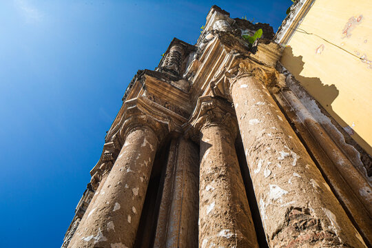 close up of columns of the ruins of santa clara church at antigua guatemala city