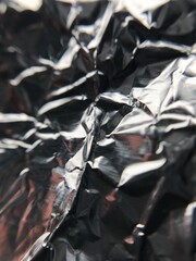 Aluminum Foil texture with blurred edges. macro image