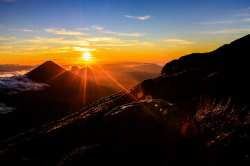 Sun rising  over the Volcano of Agua and view from Volcano of Acatenango in Guatemala