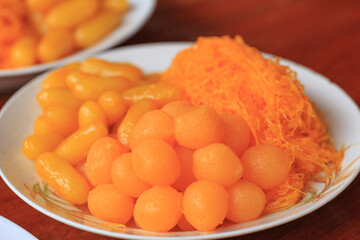 Traditional Thai desserts, Thong Yod and Foi Thong made from sugar and eggs. to fry in oil