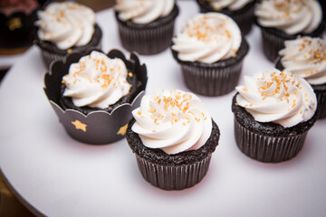 Chocolate cupcakes with white cream